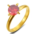 Minimalist gold titanium ring with a red round zircon gemstone in a four-prong setting - Gold/Red Zirconia