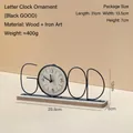 Modern black iron GOOD letter desk clock with wood grain dial on a natural wooden base - Black Good