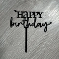 Black acrylic Happy Birthday cake topper with heart and stars on a wooden background - Small Star Black