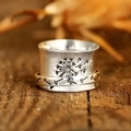 Vintage punk dandelion engraved spinner ring in stainless steel with a rotating band - US 6 / Antique Silver