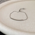 Elegant adjustable silver box chain bracelet with curved polished bar and slider clasp - Silver