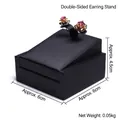 Black leather texture earring display stand with gold rose studs on a white background - Double-Sided Earring Stud Holder (Black)