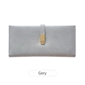 Minimalist matte grey long wallet for women featuring a stylish golden metal buckle closure - Gray