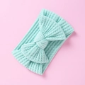 Macro detail of a light blue waffle knit baby headband featuring a soft decorative bow - Light Blue-Bow