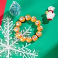 Orange gold Christmas beaded bracelet with snowman print and elastic stretch band - Orange / Snowman Full Body Print