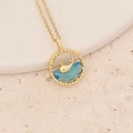 Detailed close-up of a golden whale tail necklace with blue gemstone ocean wave pendant - Small Whale Ring Style (4#)