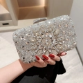 Elegant silver evening clutch bag with sparkling rhinestones and crystal flower clasp - Silver