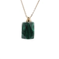 Close-up of green malachite perfume bottle pendant on a delicate golden chain necklace - Malachite Perfume Bottle (Gold Chain)