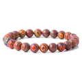 Colorful striped beaded bracelet with vibrant concentric patterns and glossy finish - Fancy Peacock Stone