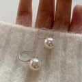 Minimalist pearl drop earrings with silver hooks and high-luster white pearls on white fabric - EH0242/Silver Pearl Hook Earring