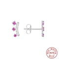 Macro shot of S925 sterling silver crown studs featuring red and white zircon stones - White Gold & Rose Red Zirconia / 925 Silver