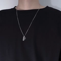 Detail of silver dual pendant necklace with engraved rectangular tag and round crest - Couple Necklace Men - Mountain Vow
