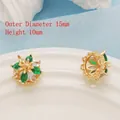 Detail of 14K gold plated floral pendant with zircon inlay showing 15mm outer diameter size - Green Star Shape (15mm)