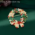 Christmas wreath brooch with colorful rhinestones and bells on green background - Wreath Bell Bow Style (HC0375)