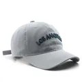 Light blue washed cotton baseball cap with Los Angeles embroidery in minimalist style - Blue