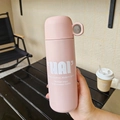 Pink matte stainless steel vacuum water bottle with a convenient ring handle and logo - 500ml / Sakura Pink