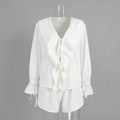 Close-up of white cotton set featuring ruffled deep V-neck and tie-front details - S / White