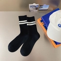 Thick combed cotton crew socks in black featuring white double stripes and knitted texture - One Size / Black
