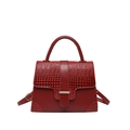 Deep red crocodile embossed leather handbag with single handle and gold-tone hardware - Red