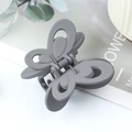 Elegant matte grey butterfly hair claw clip with hollow wing design for stylish hair updos - Rubber Grey