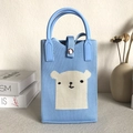 Blue knitted handbag with cream polar bear pattern and rounded handle for women - Big & Small Eyes Blue