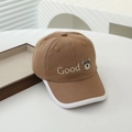 Close-up of khaki cotton kids baseball cap with embroidered bear and Good text - 50cm (1-3 Years) / Good Bear (Khaki Brown)