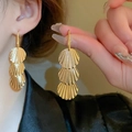 Elegant triple-layered gold scallop shell drop earrings with polished metallic fringe - Three-layer Scallop Pendant / Gold