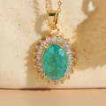 Vintage 14K gold plated necklace with green oval resin pendant and zircon halo - Green