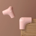 Protezioni angolari in silicone rosa a forma di dinosauro per tavoli in legno - Angolo Dinosauro Corto Rosa