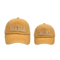 Detail of embroidered MAMA and MINI lettering on mustard yellow cotton baseball caps - Yellow