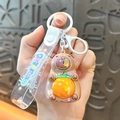 Cute cartoon capybara keychain with rotating face and orange charm on a clear strap. - Sitting Electroplated Style - Coffee