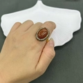 Vintage gold ring featuring an oval brown sandstone center with double cubic zirconia halo - K-0899 Goldstone Oval Ring