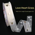 2.5cm sheer chiffon ribbon with gold heart pattern for gift wrapping and cakes - Gold Stamped Sheer Heart Grass