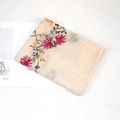Beige embroidered linen shawl scarf with colorful floral patterns on white surface - 170x90cm / Beige