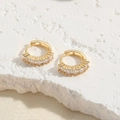 Elegant gold huggie earrings featuring five clear rectangular-cut cubic zirconia stones - White Zirconia Small Square