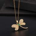 Golden dragonfly necklace with green gemstones and white crystals on a black base - Style X-Gold Emerald Gemstone Frosted