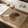 Linen-look dish drying mat with brown geometric shapes and black leaf pattern - Orange Branch Rhythm / 30*40cm [Waterproof Thin Leather]