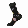 Green mid-calf cotton socks featuring colorful donut patterns and knit text details - Black Donut