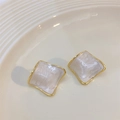 Square gold-plated geometric earrings with white marble enamel inlay in jewelry tray - White