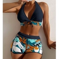 Detail of high waist boyleg bikini bottom with tropical leaf print and navy halter top - S / Black