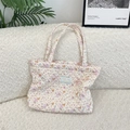 Quilted floral tote bag with cartoon bear pattern and soft blue woven label detail - Colorful Star Puppy