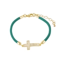 Detailed view of dark green cord bracelet with gold pavé-set cross and lobster clasp - Cross / Sky Blue