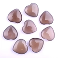 Polished grey-brown heart-shaped natural stone crystals arranged in a circle - Grey Agate