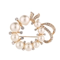 Golden flower heart brooch with white pearls and sparkling rhinestones on white background - Xd8794