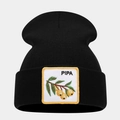Close-up of black knitted beanie featuring embroidered fruit patch with PIPA text detail - Loquat Pattern