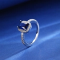 Silver adjustable ring featuring square blue zircon and pavé diamonds on blue background - Square Style (A-72)