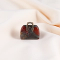Mini handbag pendant in red and grey natural stone with golden metal handle - African Blood Stone