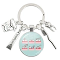 Silver dental care keychain featuring toothpaste, toothbrush and floss charms - Educational Dental Illustrations (40)