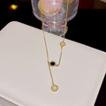 Rose gold titanium necklace with Roman numerals and reversible black and white pendants - X678 Long Roman Numerals