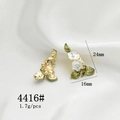 Detail view of 24mm x 16mm gold rose earrings with white enamel on silk background - 4416# Gold Enamel Flower Earrings